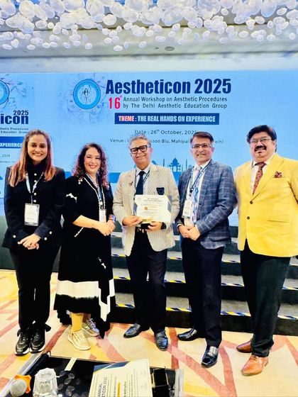 Another photo from the stage at Aestheticon 2025, celebrating the successful completion of the workshop.