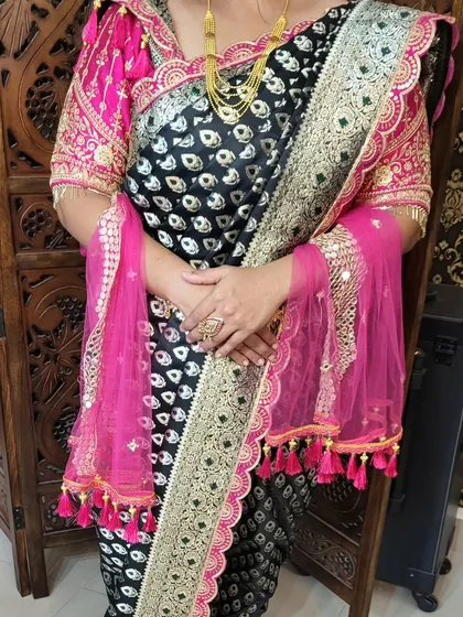 A trial session for a dhoti style draping. This allows the client to see how the final look will be and make any adjustments for comfort and style before the main event.