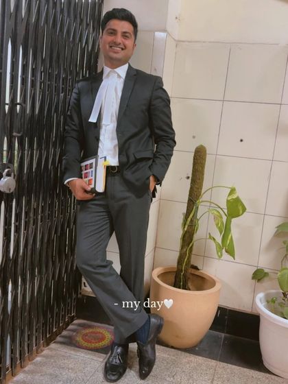 Ready for the day, holding my case files. Every day is an opportunity to fight for justice.