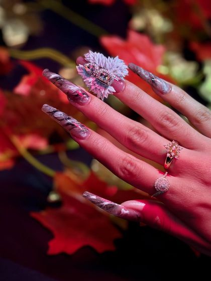 This close-up highlights the intricate, multi-layered 3D flower, a challenging technique taught in our courses.