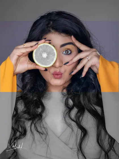 An experimental edit from our creative portrait session. I used a graphic overlay and desaturated tones to give this playful shot a more artistic, magazine-style feel.