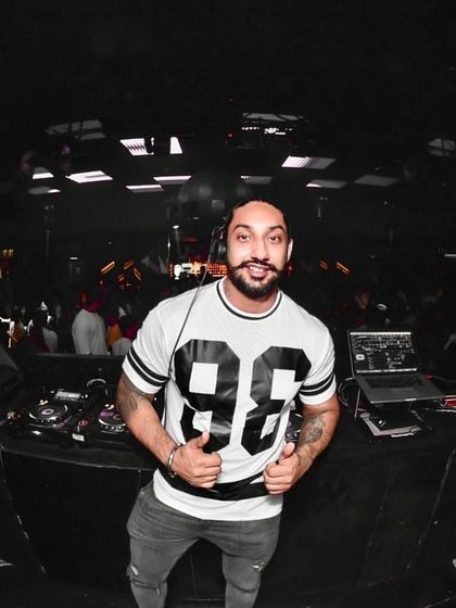 A fisheye photo from the booth, giving a thumbs-up to the crowd. I'm all about positive energy and good times.