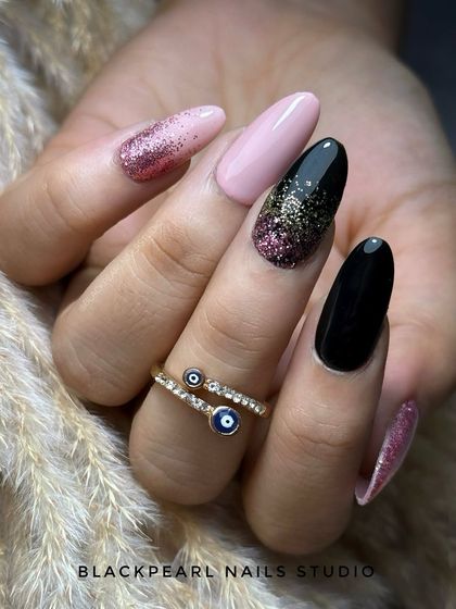 A luxurious and edgy design combining black polish, a soft nude pink, and a magical waterfall glitter cascade. This set is all about elegance, sparkle, and boss energy.