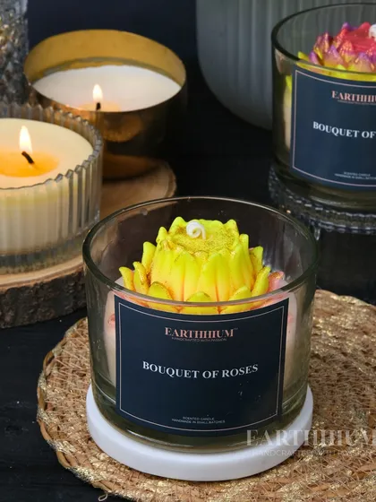 The 'Bouquet of Roses' candle in a bright, cheerful yellow, perfect for bringing a bit of sunshine indoors.