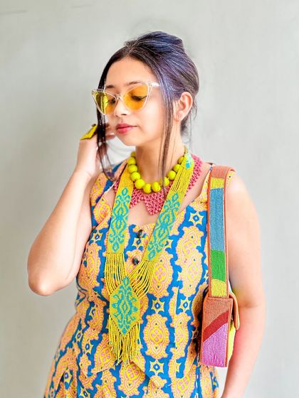 A final candid shot of my dopamine-filled outfit. The accessories truly make the look.