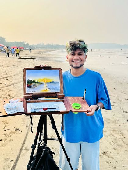 Here I am with my finished painting at the beach in Goa. The feeling of capturing a sunrise with my own hands is just pure joy.