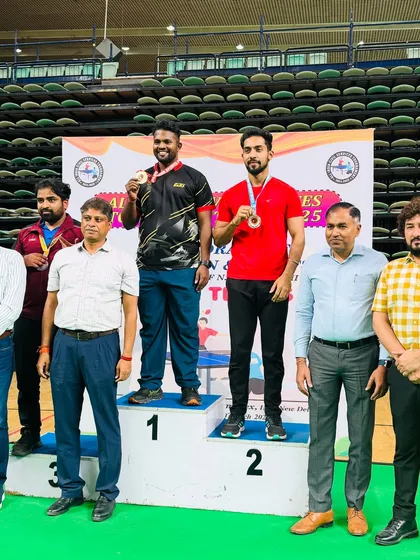 Our coach Akash Gupta on the podium after securing the runner-up position in the Men’s Singles at the All India Civil Services Table Tennis Tournament 2024-25.