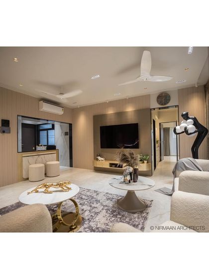 A wide perspective of the Duplex Project living room, highlighting the spacious layout and the seamless integration of different seating zones. The design is perfect for large families and entertaining guests.