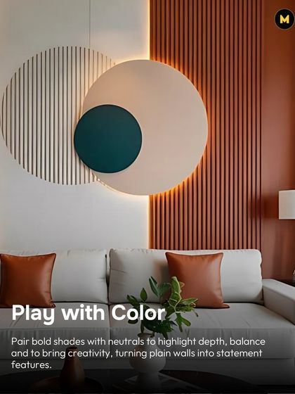 Don't be afraid to play with color. Here, bold shades are paired with neutrals on a feature wall to highlight depth, balance, and creativity, turning a plain wall into a statement.