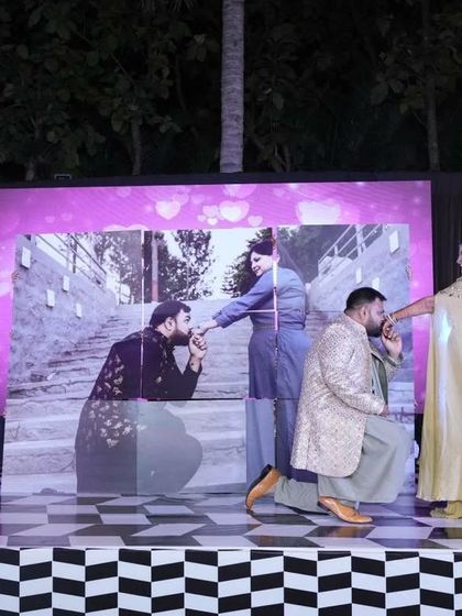 A recreation of their proposal photo on the LED screen as the couple dances. I love incorporating personal stories and elements into the sangeet choreography.