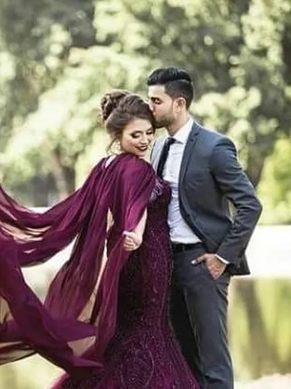 Create your dream pre-wedding photoshoot with our collection of flying gowns. This deep purple gown features a flowing cape that catches the air perfectly, ensuring your photos are nothing short of magical.