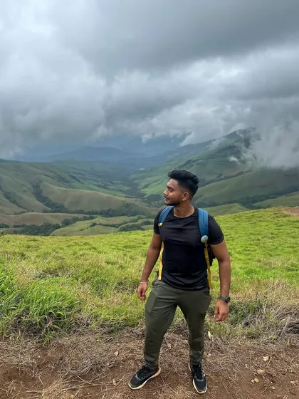 Taking a moment to admire the stunning valley views at Kudremukha. The landscape here is a photographer's dream.
