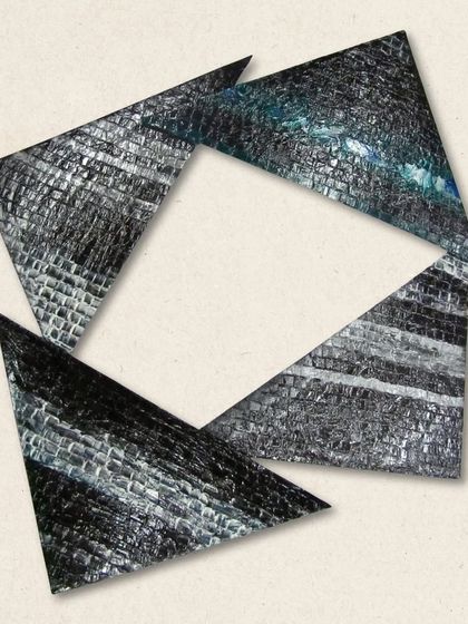 "Fragmented Motion," a throwback to 2011. This wall piece explores the dynamic interplay of form and texture through angular, textured fragments.