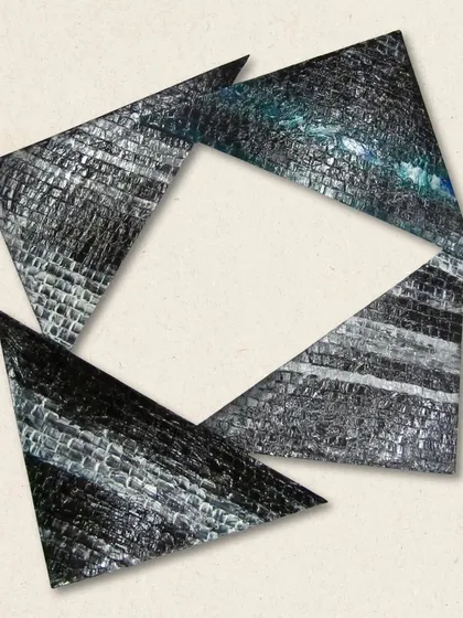 "Fragmented Motion," a throwback to 2011. This wall piece explores the dynamic interplay of form and texture through angular, textured fragments.