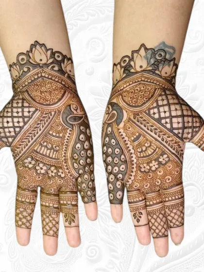 A stunning combination of a peacock and mandala art, with the peacock's body forming the center of the design.