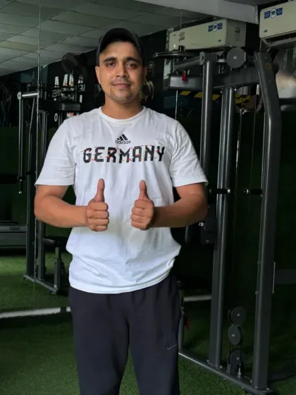 Thumbs up for a positive mindset and a strong workout.