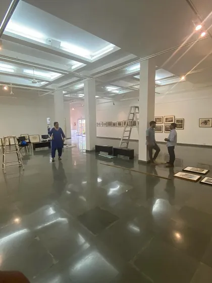A wide shot of the gallery during the installation of 'Hand Prints'.