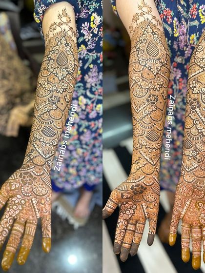 A full bridal design with beautiful, intricate details from hand to elbow.