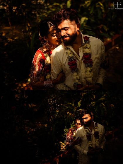 A beautifully moody and intimate portrait of a couple from their Mantra Mangalya wedding. The dramatic, low-key lighting creates a private, romantic feel, highlighting their connection amidst the natural surroundings.