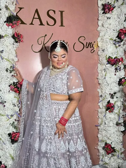 A beautiful plus-size bride looking radiant. I believe makeup is for everyone, and I teach how to enhance the beauty of every face shape and size.