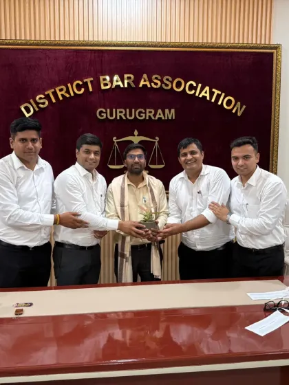 Presenting a plant to another esteemed faculty member from MDU. We value their contribution to legal education.