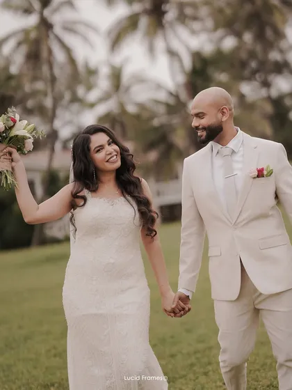 The pure, uninhibited joy of a bride celebrating with her new husband. We live for these energetic, candid shots that tell a story of happiness and new beginnings at a beautiful Christian wedding.