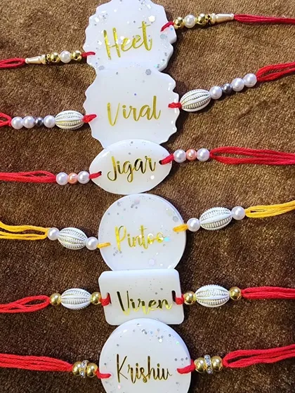 A collection of personalized rakhis ready to be shipped for Raksha Bandhan.