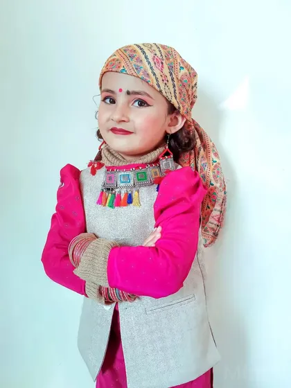 A proud "Pahadan" look for this kids portrait. Dressing up in traditional Himachali attire adds a beautiful cultural element to children's photography.