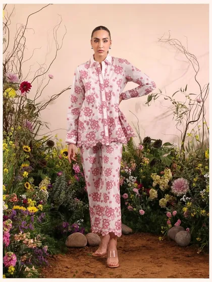 A beautiful pink and white floral co-ord set, perfect for a brunch date. The scalloped hem adds a playful, feminine detail.