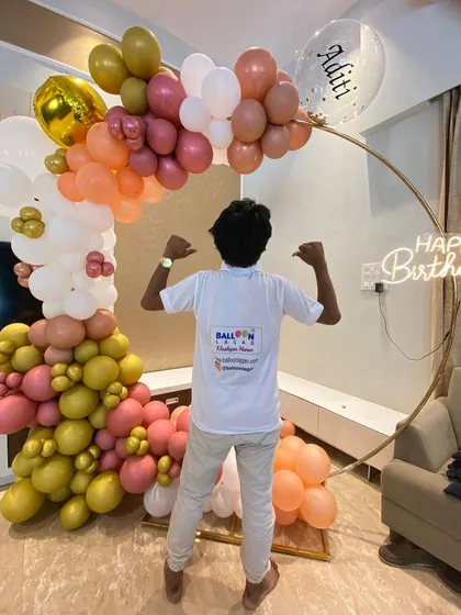 Teamwork makes the dream work. A proud moment for our decorator after completing a complex and beautiful organic balloon arch for a birthday celebration at home.