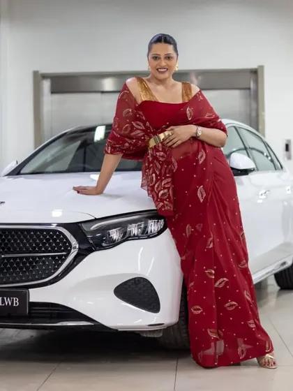 A confident pose showing the blend of traditional Indian attire with modern luxury. This is what fusion is all about.