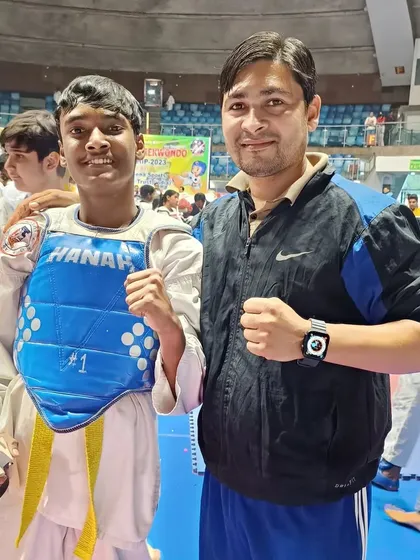 A student ready for his match, showing his determination.
