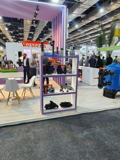 A display shelf at our Sahara Expo booth, neatly organizing our range of irrigation components for visitors to inspect.