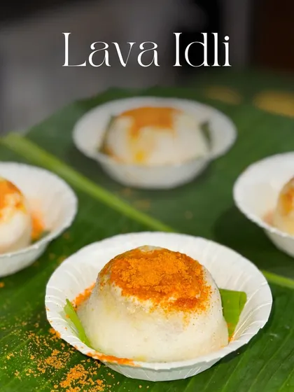 My Lava Idli is a classic with a fiery twist. These soft, fluffy idlis are filled with hot sambar that flows out like lava when you cut into them, creating a delightful and interactive food experience.