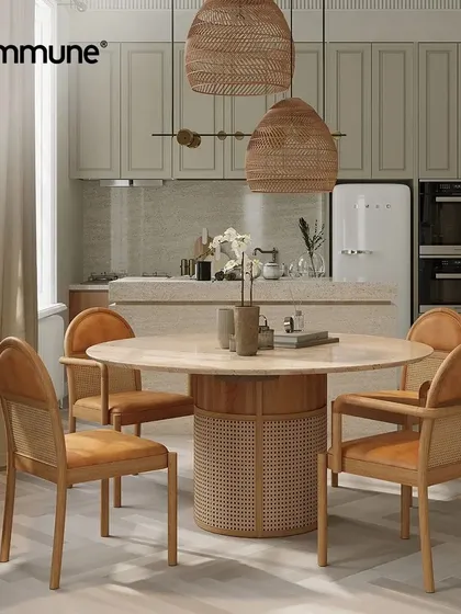 We bring natural artistry to your dining space with the Siena Dining Set. The centerpiece is a magnificent round table with a premium travertine stone top and a rattan-wrapped base, paired with elegant chairs upholstered in tan leather. This collection creates an atmosphere of tropical sophistication and effortless grace.