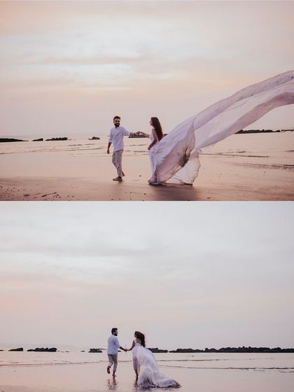 A dreamy, ethereal scene on a Goan beach at dusk. The soft light and the bride's flowing white gown create a magical, almost painterly effect, capturing a moment of pure romance by the sea.