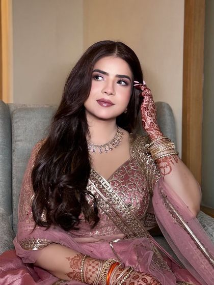 Another beautiful portrait of Navya. The makeup is designed to look stunning in photos, capturing the happiness of the day.