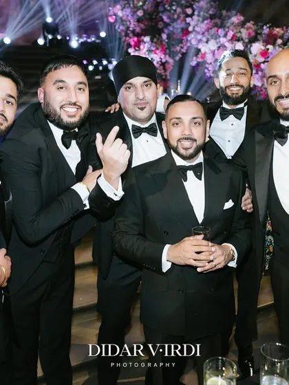 The Kudos Music crew celebrating with the groom. We're a family, and being part of these huge life moments together is what it's all about.