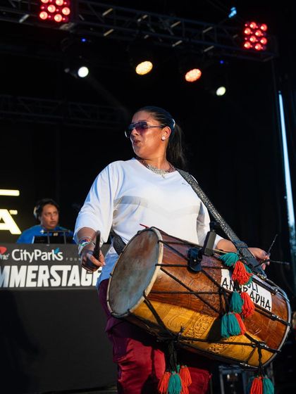 The amazing Dholi Anuradha on the dhol, with me on the decks behind her. Live percussion is a key element I incorporate into my event production to create an authentic, high-energy sound.