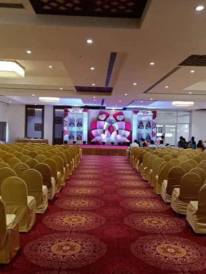 Another shot of the seating arrangement at Balaji banquet hall, showing its capacity to host large gatherings in a comfortable, air-conditioned environment.