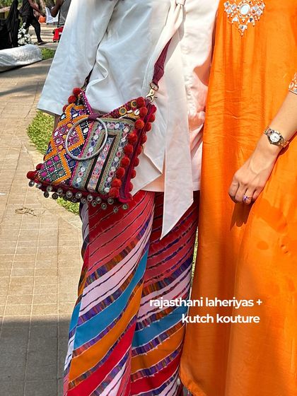 A detail shot showcasing our personal style: a mix of Rajasthani laheriyas and Kutch kouture. This reflects our love for combining different Indian textiles and crafts in a unique way.