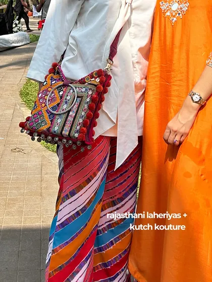 A detail shot showcasing our personal style: a mix of Rajasthani laheriyas and Kutch kouture. This reflects our love for combining different Indian textiles and crafts in a unique way.