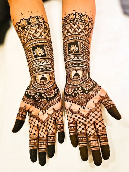 A clear, symmetrical shot displaying the full design on both hands, perfect for brides who love a balanced and traditional look.