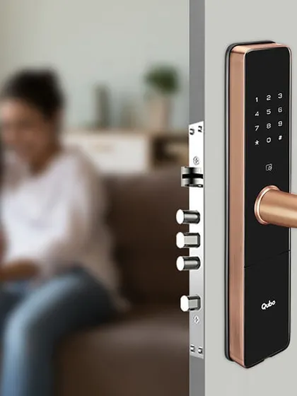 Secure your home with a modern smart lock that combines elegant design with robust security. This model features multiple access methods, including a fingerprint scanner and a digital keypad, shown here with its multi-point locking mechanism for enhanced protection.