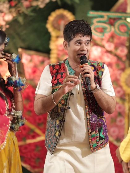 Another angle of me interacting with the happy couple. I make sure they are the center of attention while ensuring all their guests are entertained.