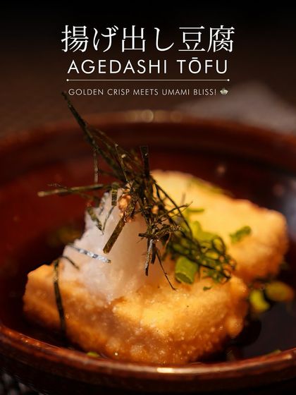 Agedashi Tofu is a classic comfort dish. We lightly dust cubes of silken tofu, fry them until golden, and serve them in a warm, savory dashi broth with grated daikon and nori.