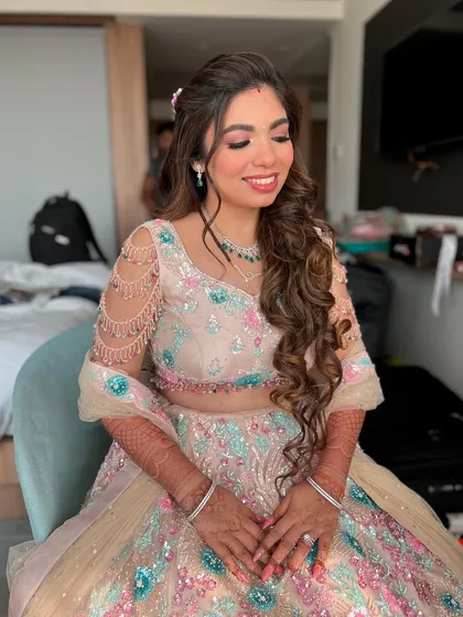 A final shot of Kejal's reception glam. The focus is on her radiant smile, complemented by a makeup look that feels as good as it looks.