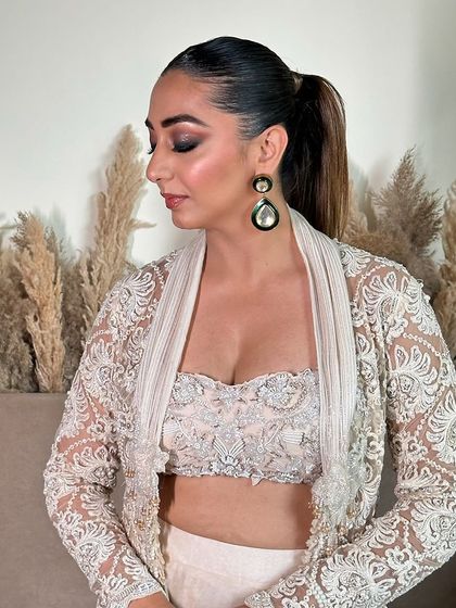 Eyes closed, this shot highlights the beautiful blending of the smokey eye makeup.