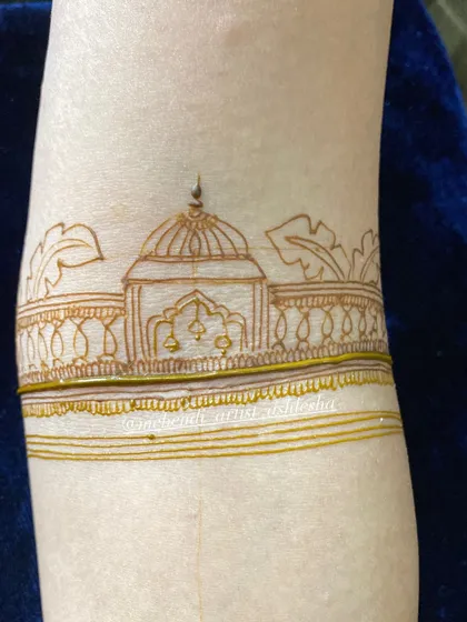 A simple and elegant startup design on the arm, featuring a temple motif. This is a great exercise for practicing clean lines.