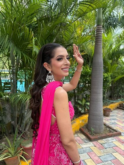 A side view showing the hairstyle I did for this look. A high, wavy ponytail is a great way to keep your hair off your face while still looking glamorous.